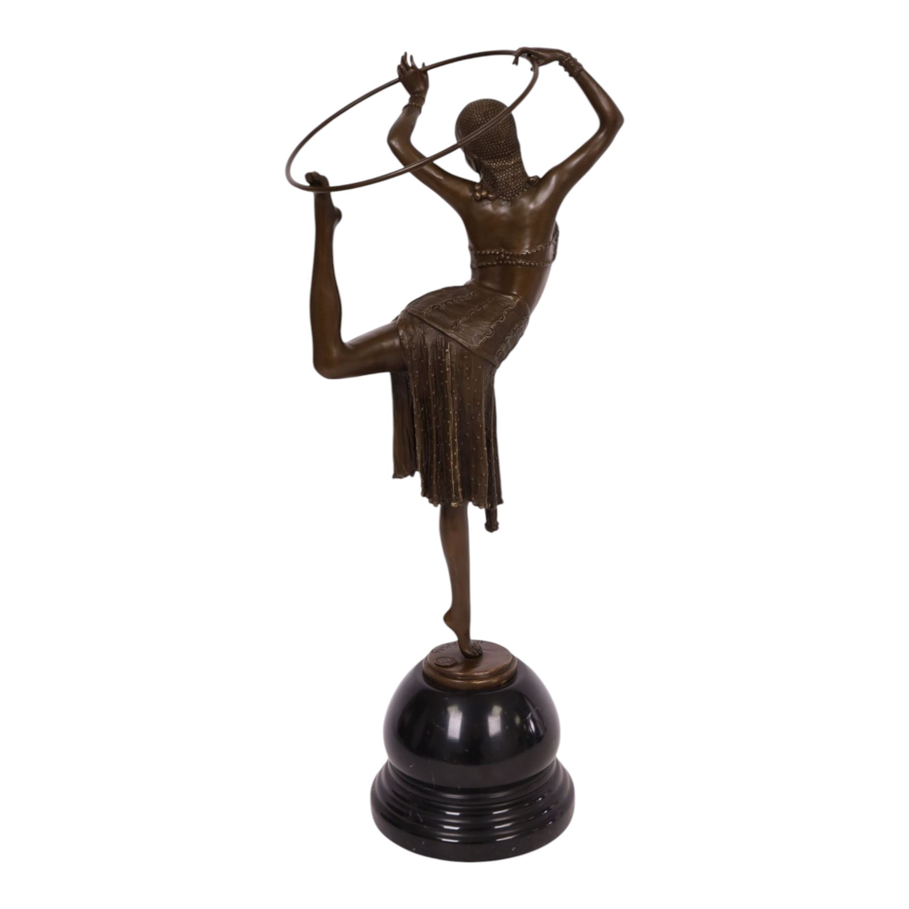 After Demetre Chiparus (1886-1947), an Art Deco style bronze modelled as a dancer with hoop, upon a stepped circular base, H51cm