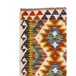Chobi Kilim runner, multi-coloured ground with overall geometric design, decorated with four stepped lozenge medallions