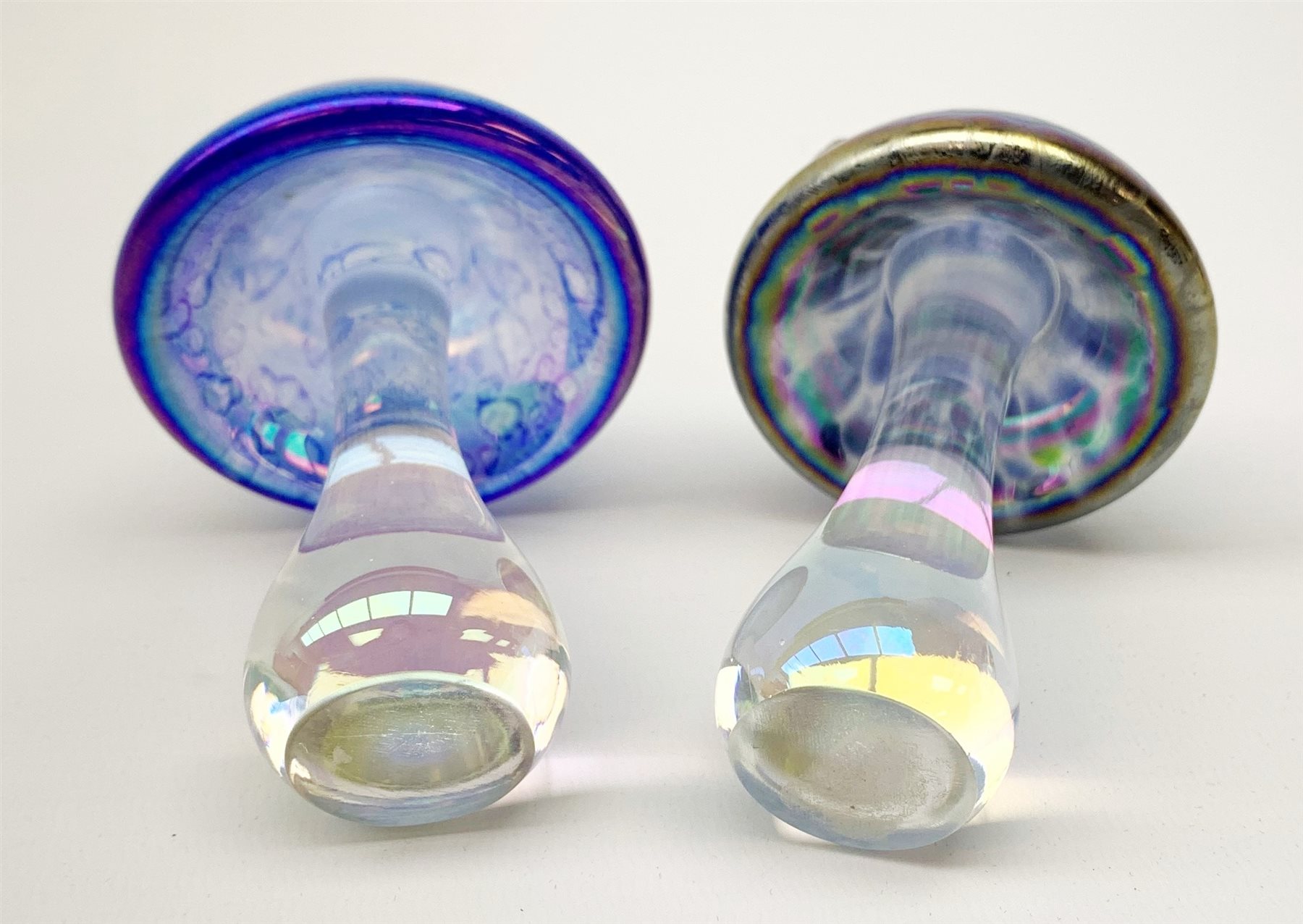 A John Ditchfield Glasform mushroom, in irridescent blue surmounted with a frog, H10.5cm, together with another similar John Ditchfield example. 