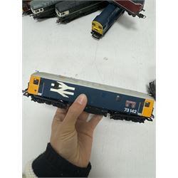 Eight Lima Ho and '00' gauge locomotives, comprising BR Class 20 locomotive no. 20222, re-worked BR Class 33 Bo-Bo locomotive no. D6585, Class 73 Bo-Bo Broadlands no. 73142, Class 73 Bo-Bo EWS locomotive no. 73128, 201640 Class BR no. 221 149-8 DB, Class 26 Bo-Bo locomotive no. D5308, Amtrak 523 diesel locomotive and Class 1400 2-4-0 no. 20215, unboxed