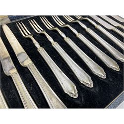 Set of six stag horn handled knives by Cooper Brothers and Sons, together with a set of silver plated dessert knives and forks for six place settings, both within fitted cases