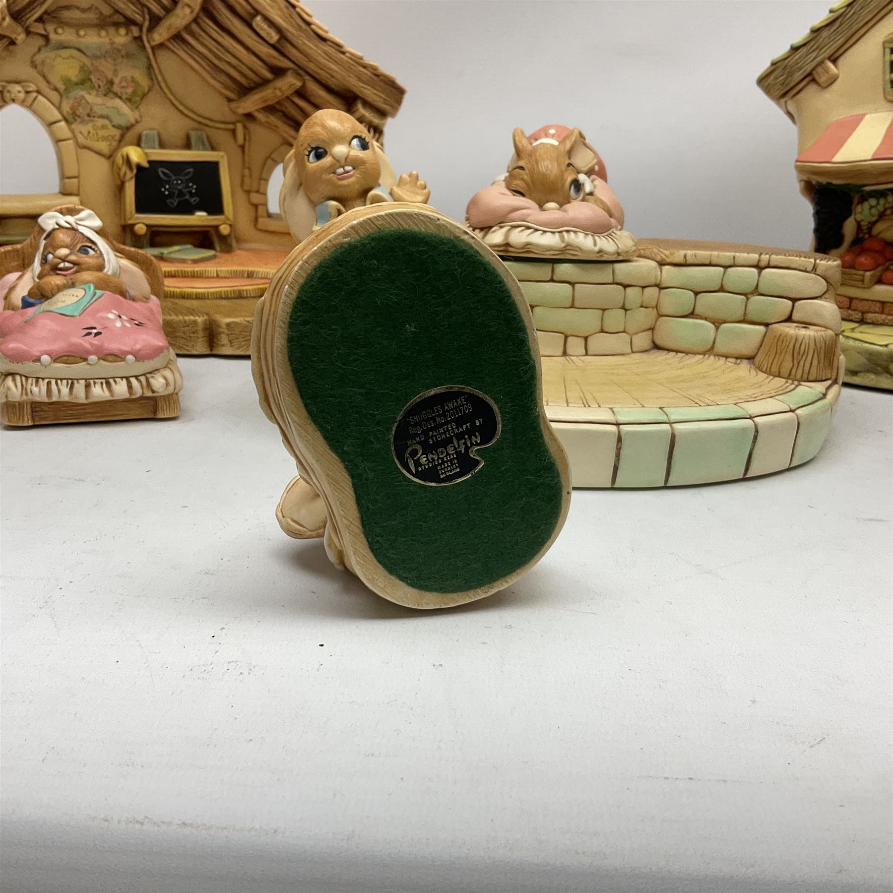 Collection of Pendelfin figures to include Band Stand 'Fruit Shop' and school house displays and six figures