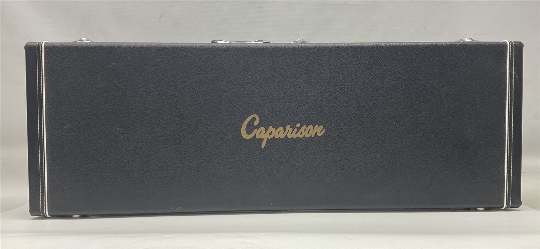 2015 Japanese Caparison Dellinger Prominence hand made boutique rock guitar in spectrum blue with clock inlays and Scaller tremolo; serial no.3200018; L100cm; in fitted case with certificate, registration card, tools etc