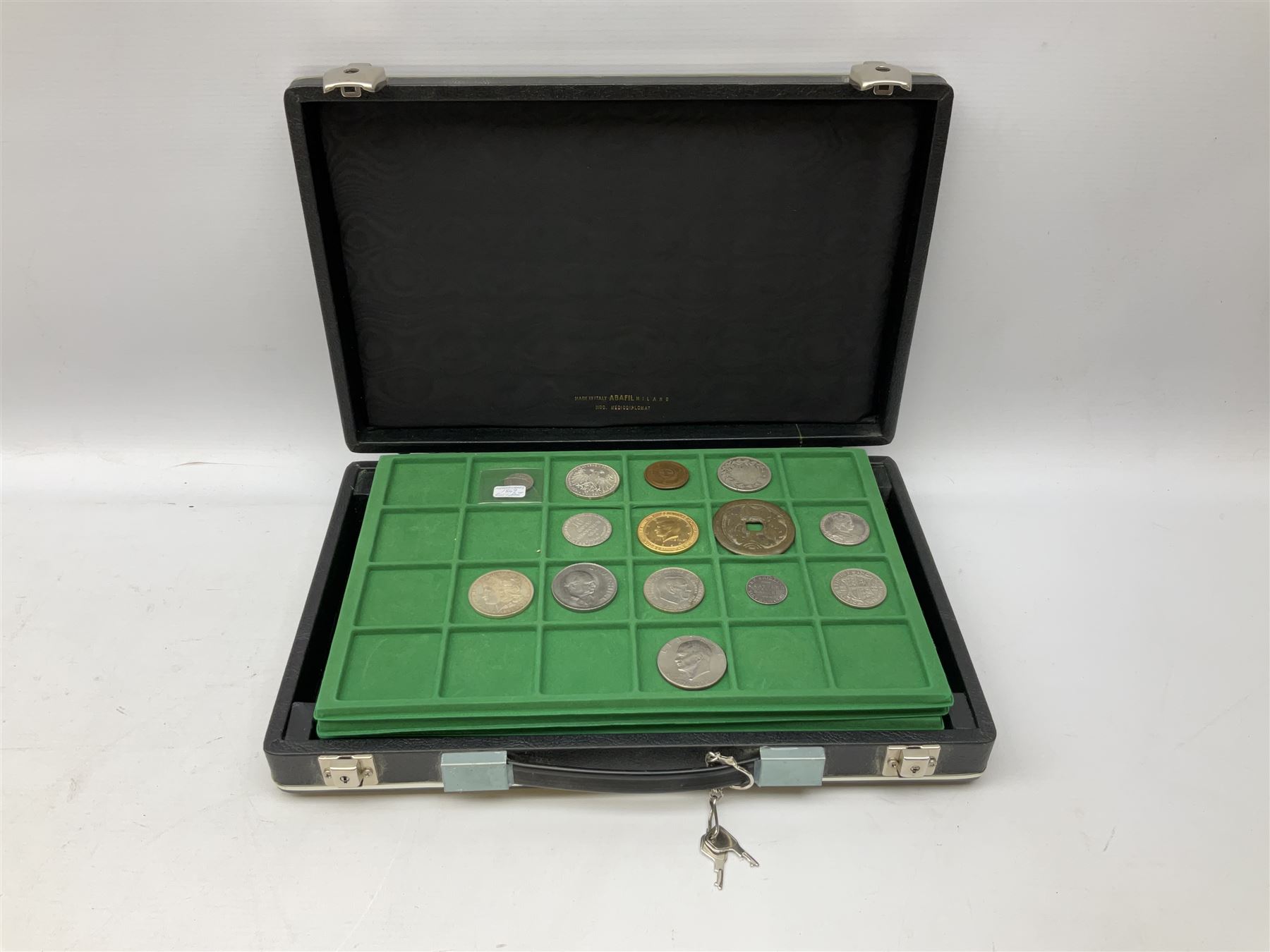 Coins and medallions including, York 1811 one shilling cattle and barber silver token, United States of America 1883O silver Morgan dollar, birds of destiny medal by Malcolm Appleby, Great British King George V 1930 halfcrown, King Edward VII 1902 silver medal, King George V 1916 halfcrown etc, housed in a case with lift out green coin trays