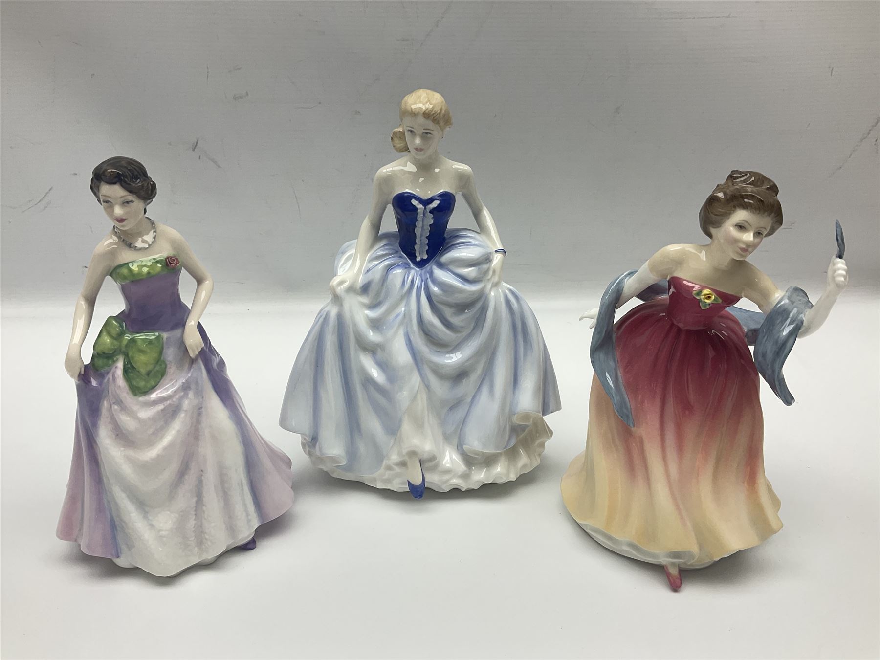 Seven Royal Doulton figures, to include Charity HN3087, Faith HN3082, Hope HN3061, Belle HN3703, etc, all with printed marks beneath