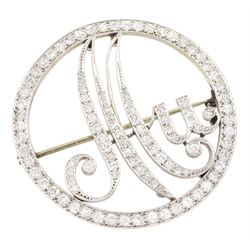 Art Deco platinum and diamond initial brooch, the circular frame and initials 'Mu' milgrain set with old cut diamonds, total diamond weight approx 2.40 carat