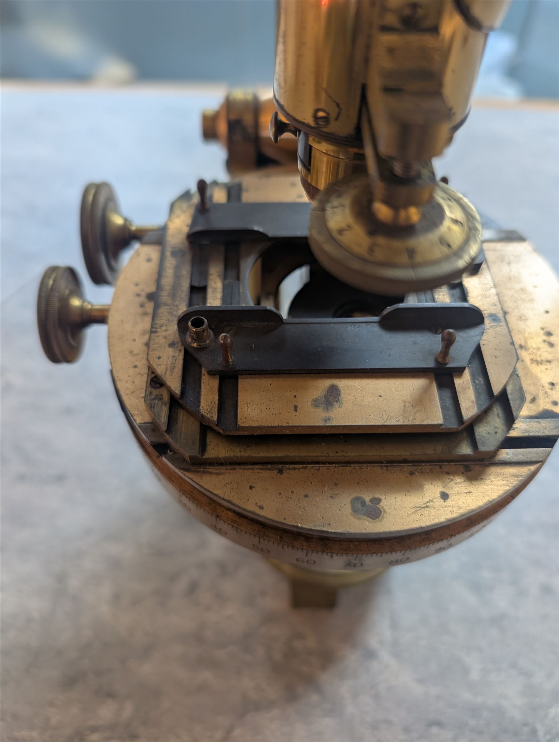 19th century brass binocular microscope by R&J Beck, 31 Cornhill London, numbered 6386, with rack and pinion focusing, housed in wooden case with case of accessories, including eyepieces, objective lenses and condenser
