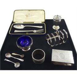 Silver toast rack by Harrison Brothers & Howson, Sheffield 1935, silver christening fork and spoon by Thomas Bradbury & Sons Ltd, Sheffield 1936, cased, silver engine turned matchstick holder, silver cruets and napkin ring, all hallmarked approx 12.1oz