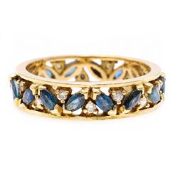 18ct gold sapphire and diamond full eternity ring, sixteen marquise cut sapphires, each spaced by a round brilliant cut diamond, London import mark 1992