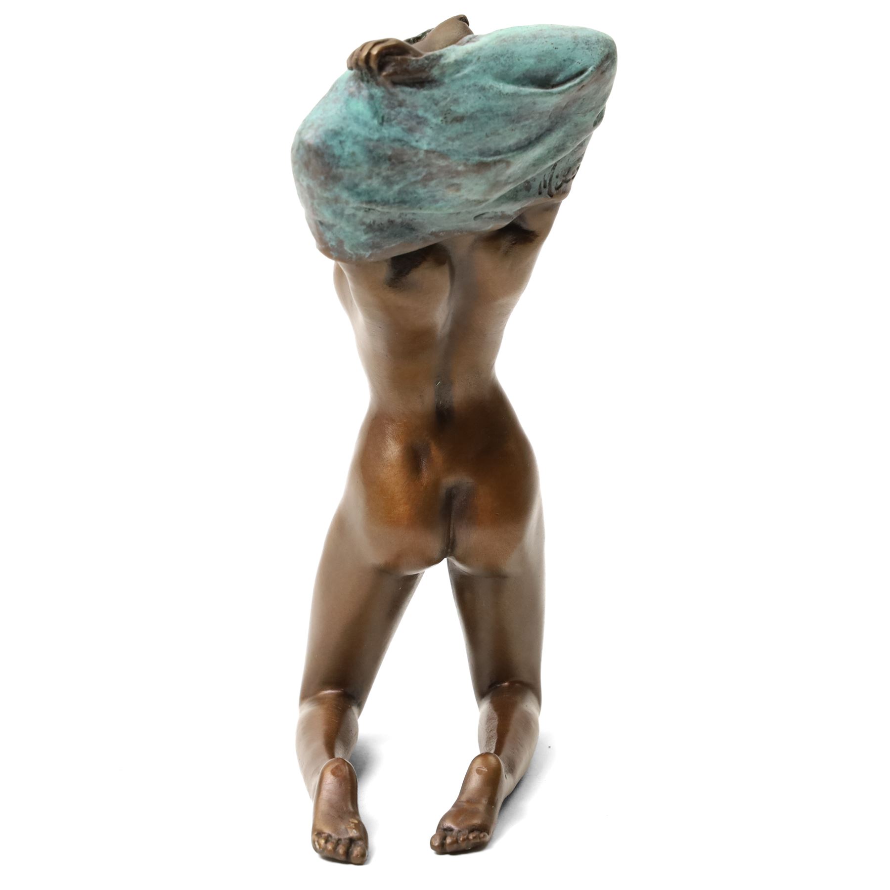 Bronze figure of a kneeling nude removing her shirt, signed 'Milo', H17cm