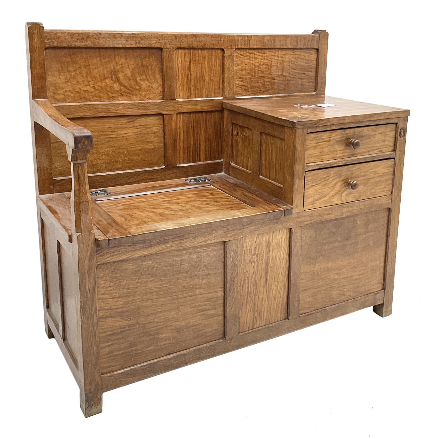 'Acornman' figured oak telephone table, panelled back above hinged seat and two drawers, panelled sides and front, all over adzing, by Alan Grainger of Brandsby, York