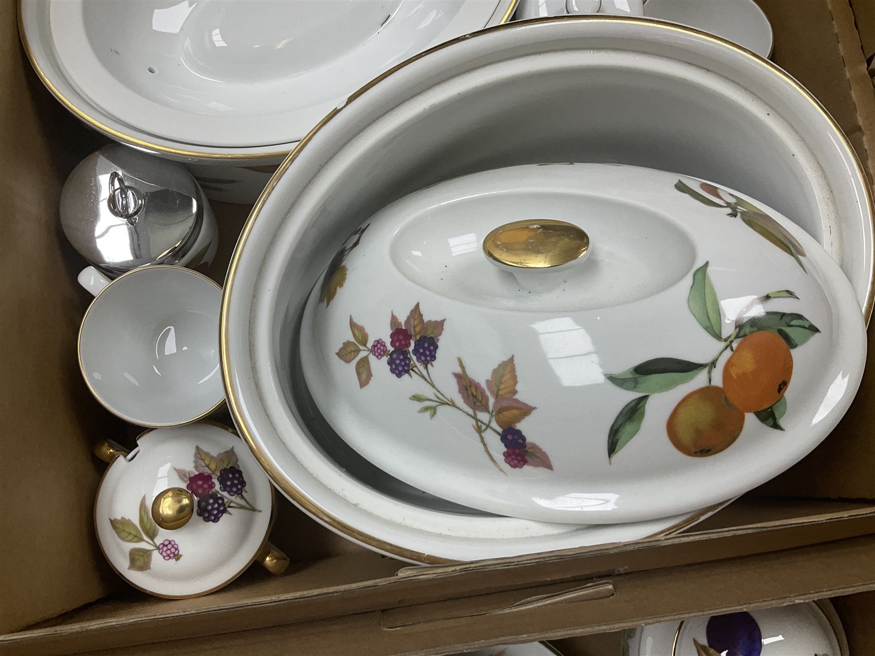 Royal Worcester Evesham and Evesham Vale tea and dinner wares, to include, three large covered tureens, coffee pot, eight tea cups and saucers, milk jug, two covered sucriers, boxed serving spoons etc, approx .130