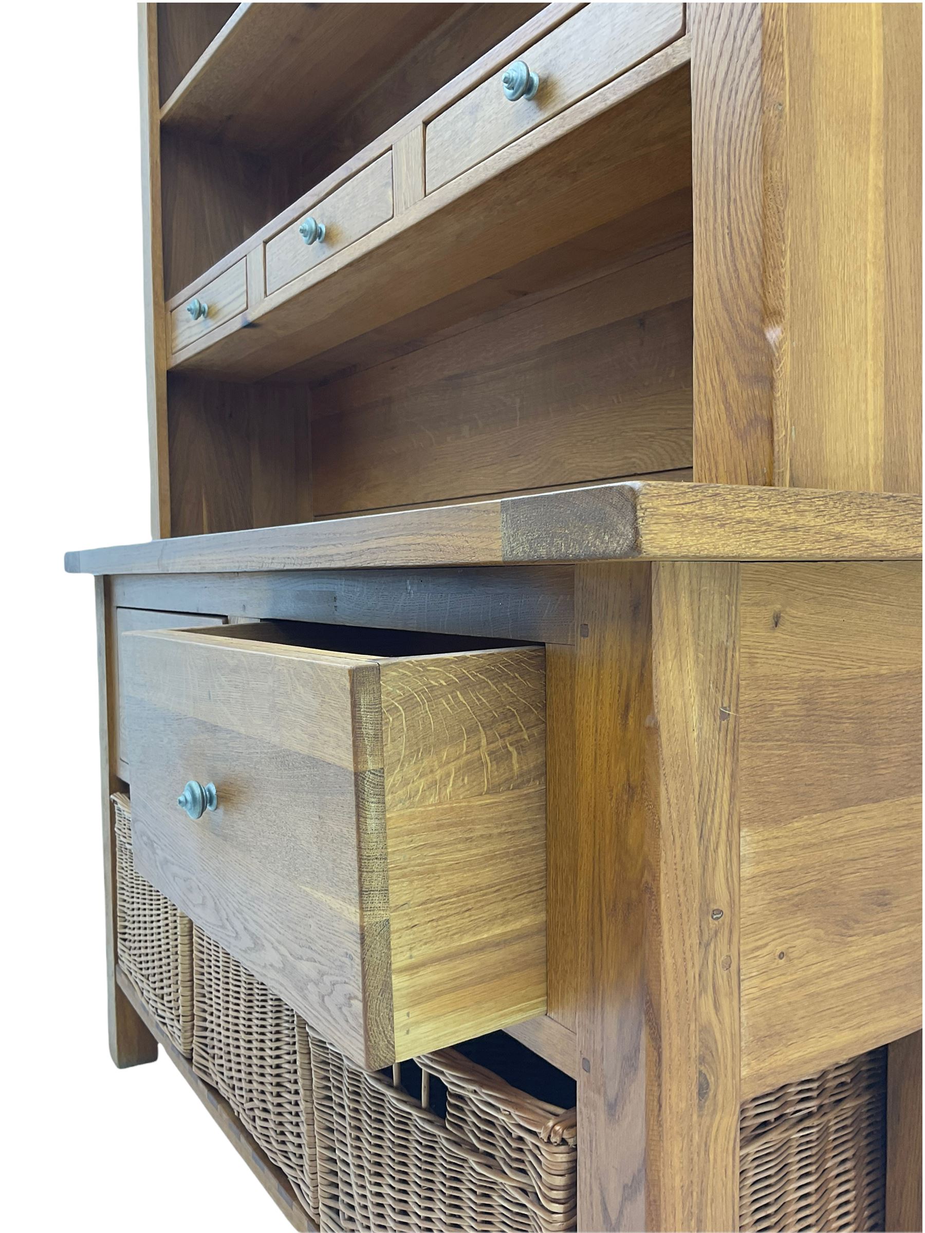 Manor Oak - light oak dresser and rack, fitted with two shelves with three drawers, two deep drawers and pot baked base with basket storage
