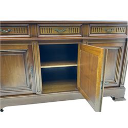 Contemporary cherry wood sideboard, rectangular moulded top over three drawers and three cupboards