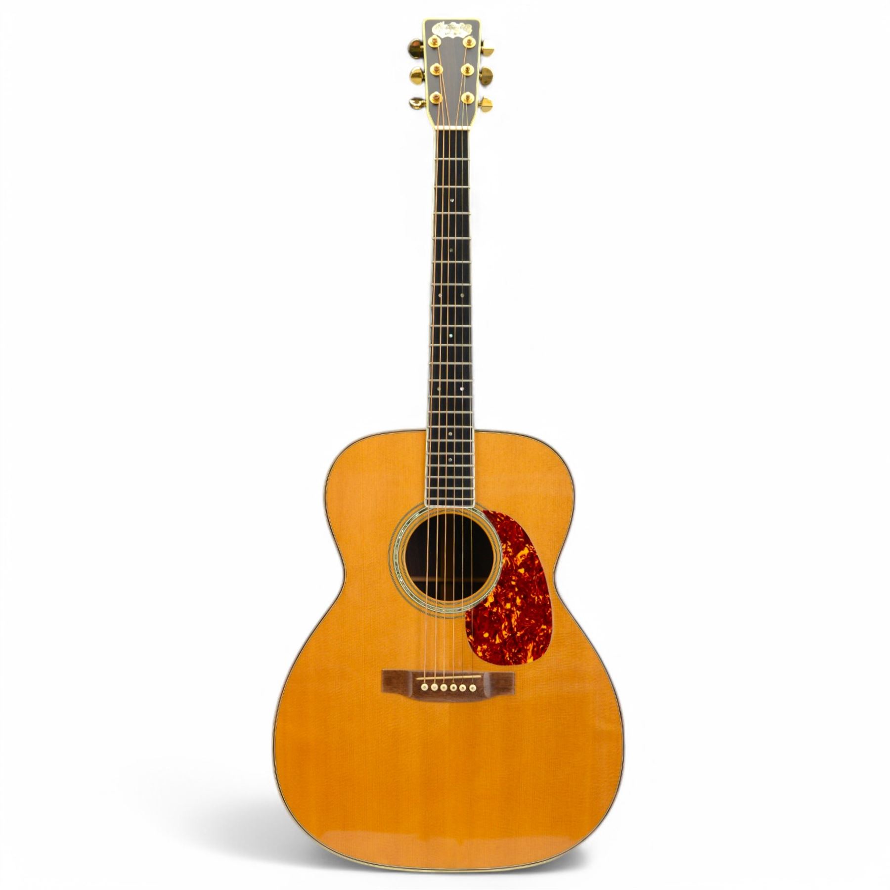 1977 Martin M-38 prototype X-38-B acoustic guitar formerly owned by John Pearse, with ebony fingerboard and inlaid mother of pearl Martin and Co logo to headstock, spruce top, serial no. 389327, bound fingerboard back and sides, original pegs, with John Pearse collection certificate of authenticity, contained within original Martin hard case with plush blue velvet interior

Notes: As illustrated on page 74 Martin Guitars: A Technical Reference, R Johnston & Dick Boat, 2009. John Pearse was a British folk guitarist, instrumentalist, and folk singer who rose to prominence in the 1960s on BBCs guitar tuition series Hold Down a Chord. 