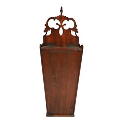 Three George III and later oak candle boxes, the first example of tapering form with shaped and pierced scroll crest, above a hinged lid, H50.5cm W18cm D13cm, the second of plain rectangular form with tapering crest, above a studded leather hinged sloped lid, H46cm W15.5cm D15.5cm, and third of plain rectangular form with demi-lune crest, with lift up front, H42.5cm W17.5cm D12cm 
