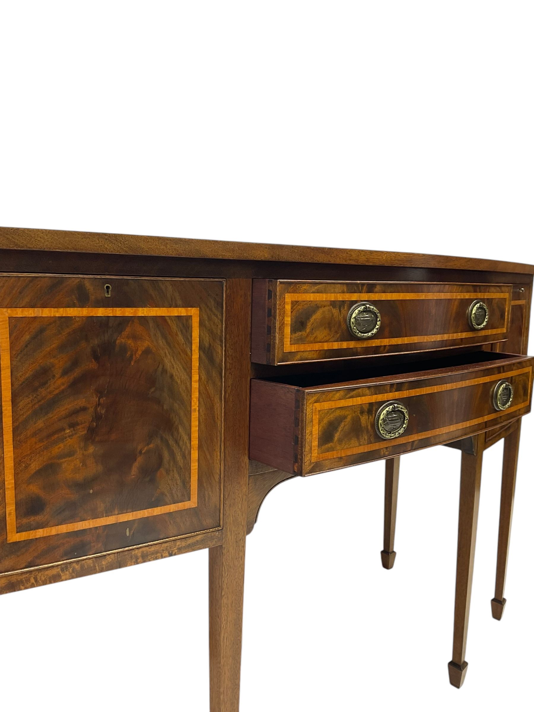 Georgian design mahogany and satinwood banded bow-front sideboard, fitted with two drawers and flanking cupboards, on square tapering supports with spade feet 