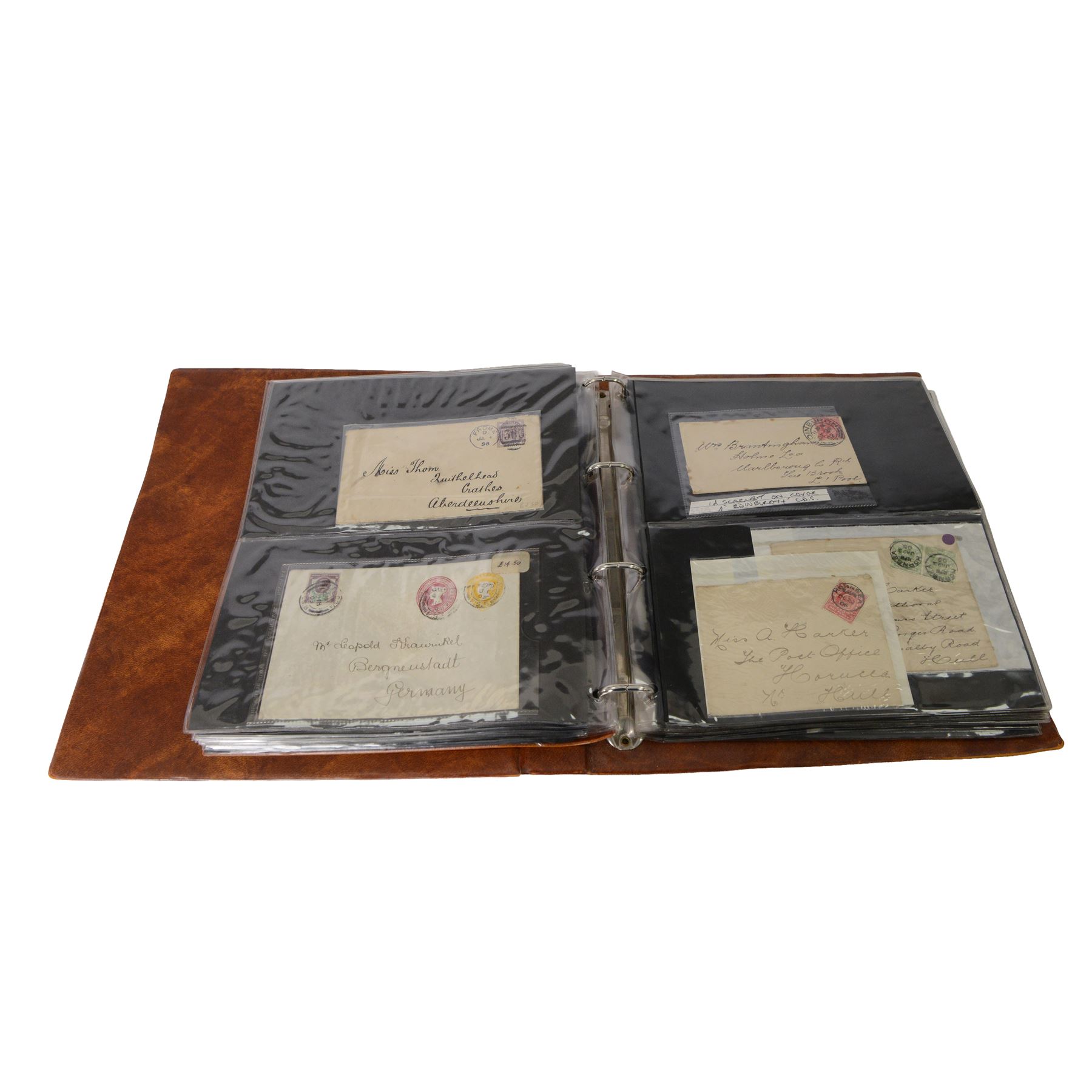 Approximately thirty-seven Great Britain Queen Victoria covers, including penny black with red MX cancel and four margins, two embossed, together with King Edward VII and later covers, in one ring binder folder