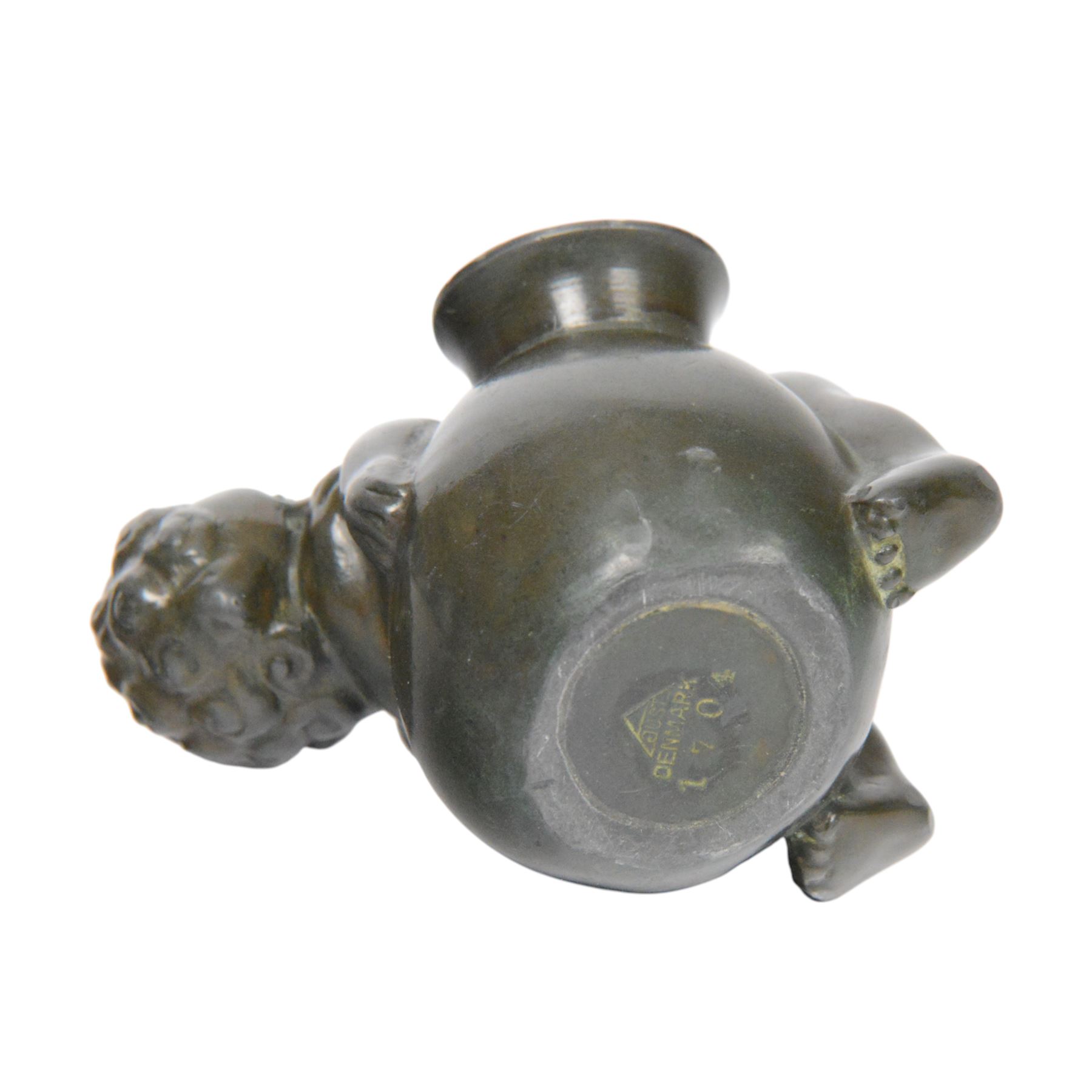 Just Andersen (Danish 1884 - 1943), bronze figure modelled as a putti sleeping upon a vase, signed beneath H6cm