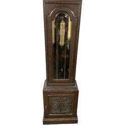 German - 8-day oak longcase clock c1910, with a carved case, swan necked pediment and fully glazed trunk door, brass dial with a silvered chapter ring with Roman numerals, minute track and silvered 