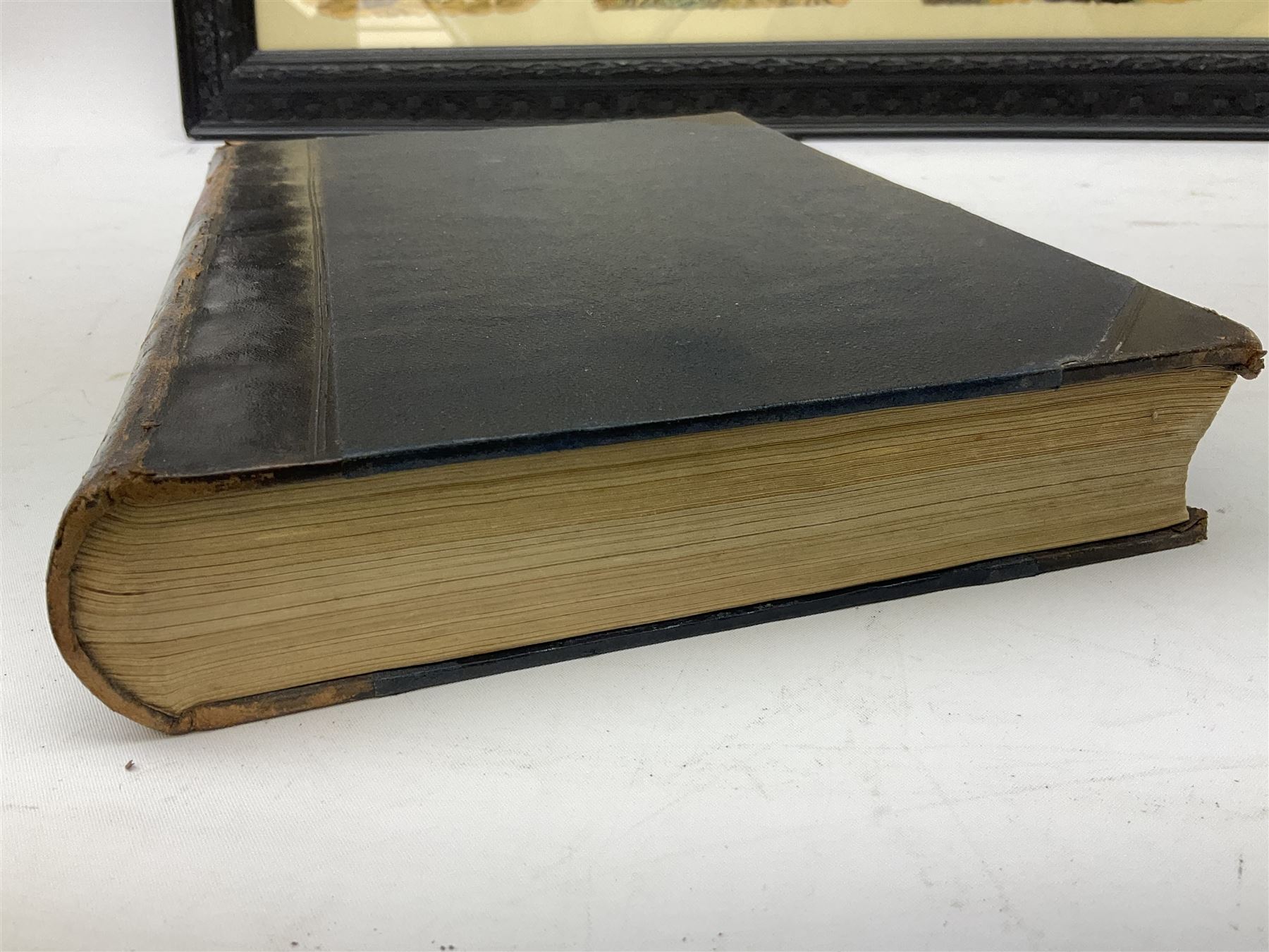 Payne (Harry) Artist: Victoria Cross Gallery; Complete set of twelve chromolithographic relief printed cards published by Birn Bros. (BB). Each: 120 x 155 mm; displayed together in an ebonised frame 54 x 82.5cm; together with the half leather bound reference book by Edwin Hodder entitled Heroes of Britain in Peace and War (2)