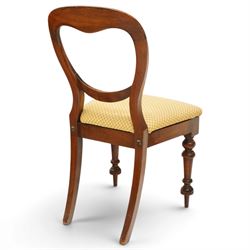 Set of eight mahogany balloon-back dining chairs, drop-in seats upholstered in yellow patterned fabric, raised on turned-front and rear-splayed supports