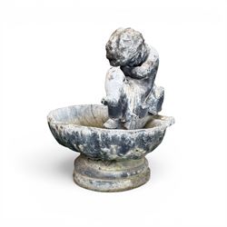 19th century lead bird bath depicting a seated cherub on a shell