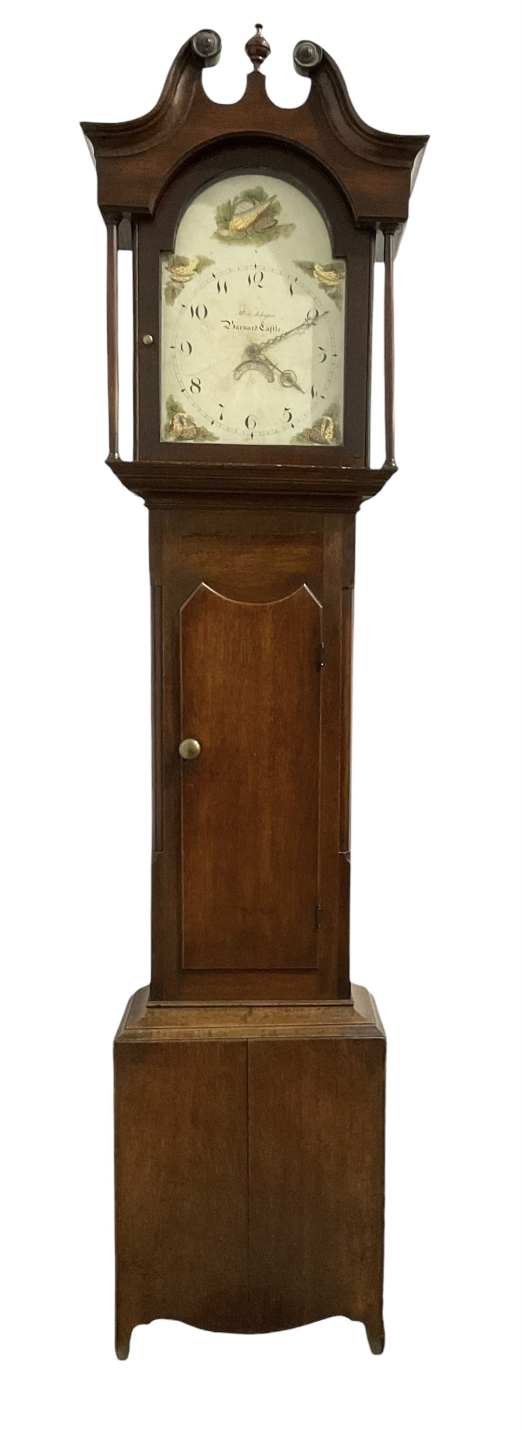 Michael Johnson of Barnard Castle (Yorks) - 30hr oak cased longcase clock c1820, with a swan necked pediment and central finial, break arch hood door flanked by turned pilasters, trunk with canted corners and a long door with a concave shaped top, on a rectangular plinth with a shaped base, painted dial with Arabic numerals, makers name, brass stamped hands and date aperture, countwheel striking, chain driven movement striking the hours on a bell.