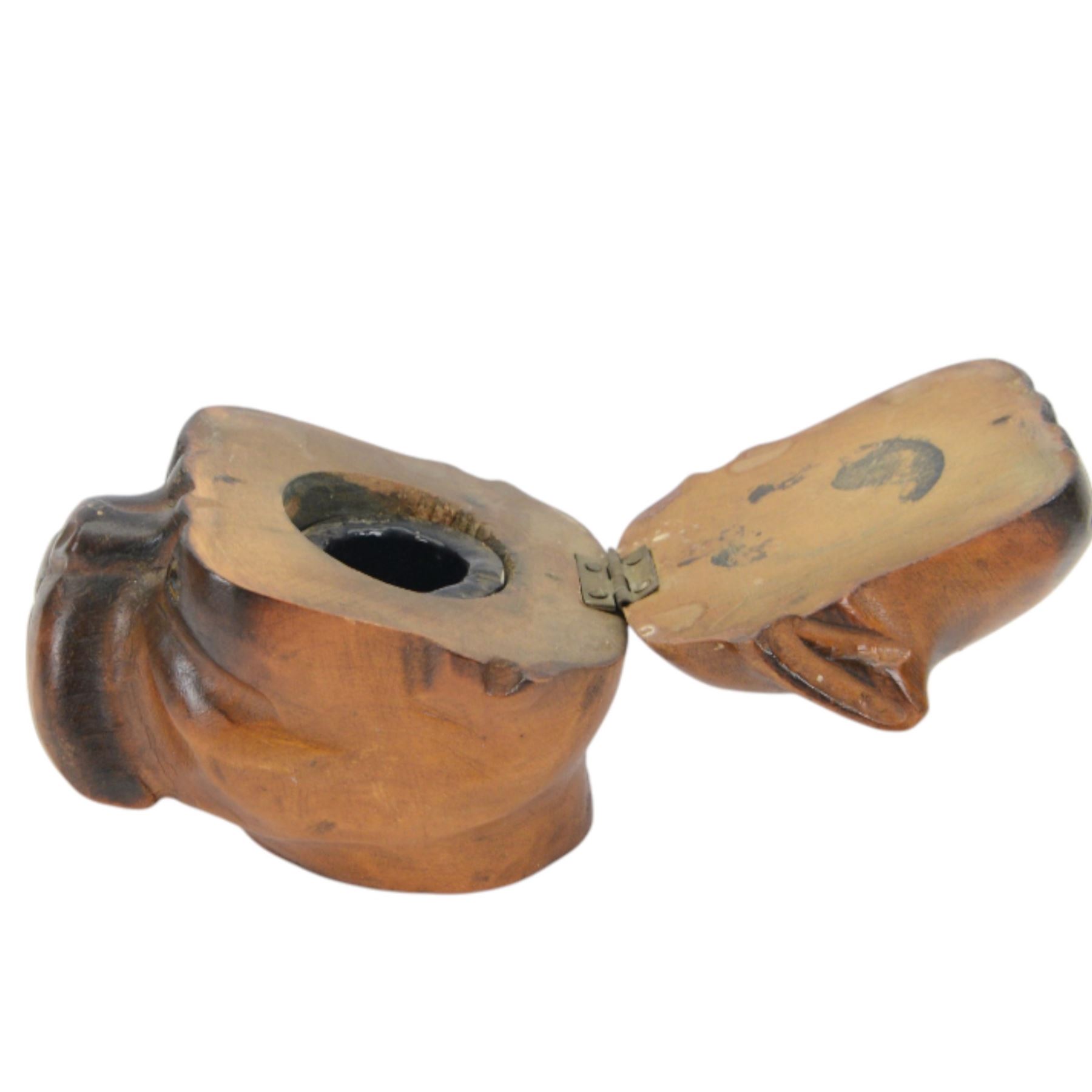 Novelty desk inkwell formed as a boat, with central chimney opening to reveal a metal inkwell with two pens formed as oars, together with another inkwell in the from of a bull dog 