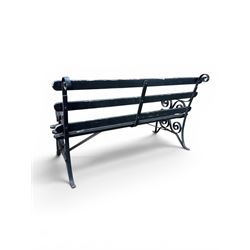 Coalbrookdale - rare pair of wrought iron and slatted wood garden benches, the twin wrought iron strapwork bench-ends formed of four scrolls over splayed feet, number 77 in the Coalbrookdale Castings Catalogue (see illustration)