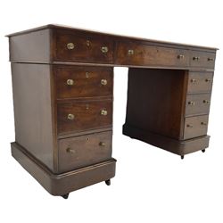 Victorian mahogany twin pedestal desk, rectangular top with inset ebonised leather writing surface, fitted with nine graduating drawers with brass pull handles, on plinth bases