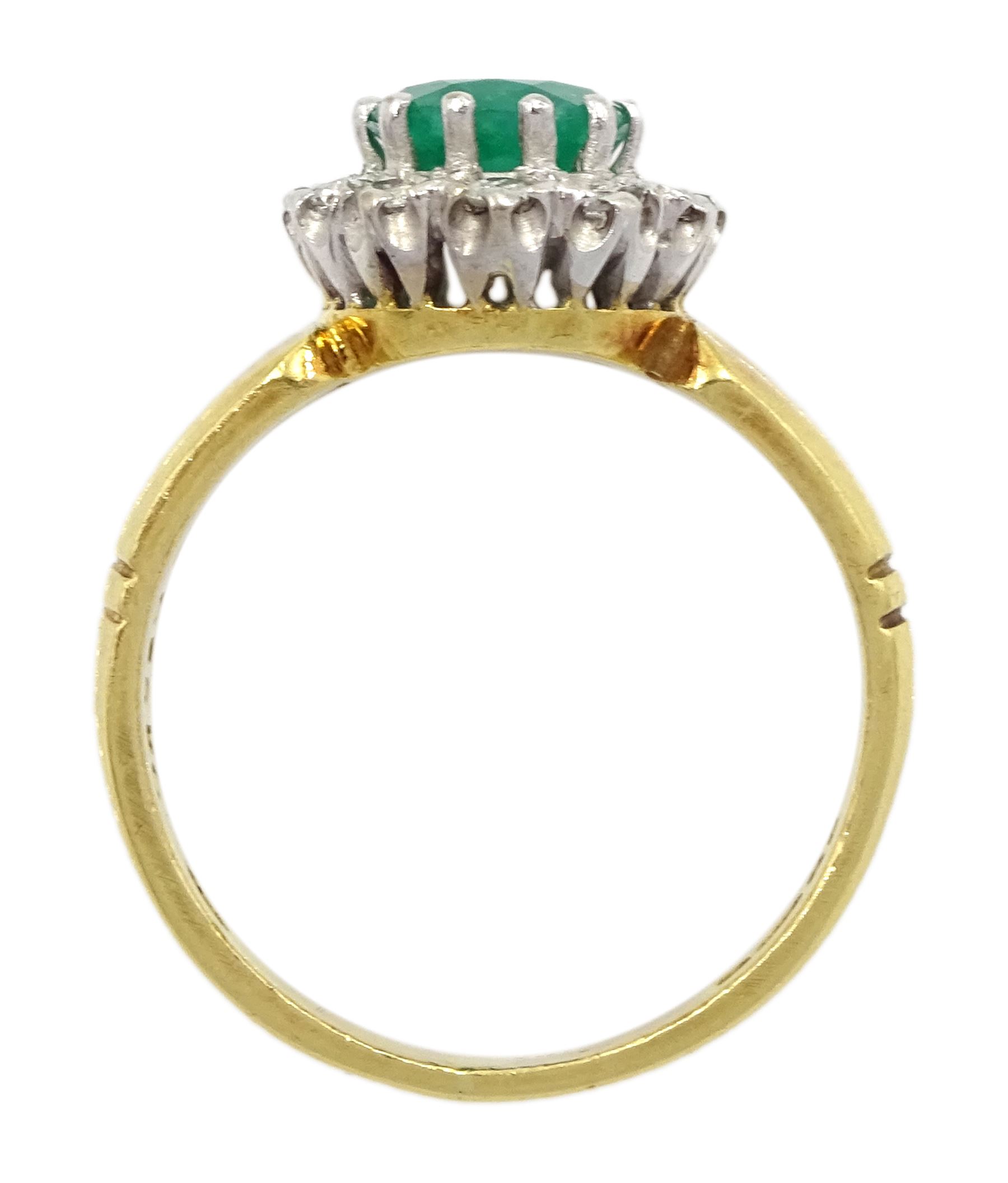18ct gold oval emerald and round brilliant cut diamond cluster ring, London 1979