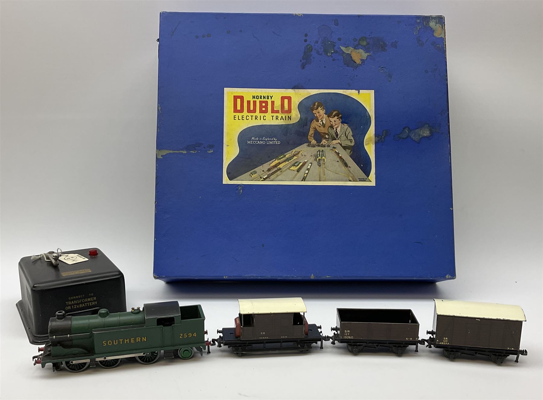 Hornby Dublo - three-rail EDG7 Tank Goods Train set with Southern Railway 0-6-2 tank locomotive in unlined malachite green livery No.2594, two wagons and guards van, quantity of straight and curved  track and controller with tested ticket, boxed with small label to lid.