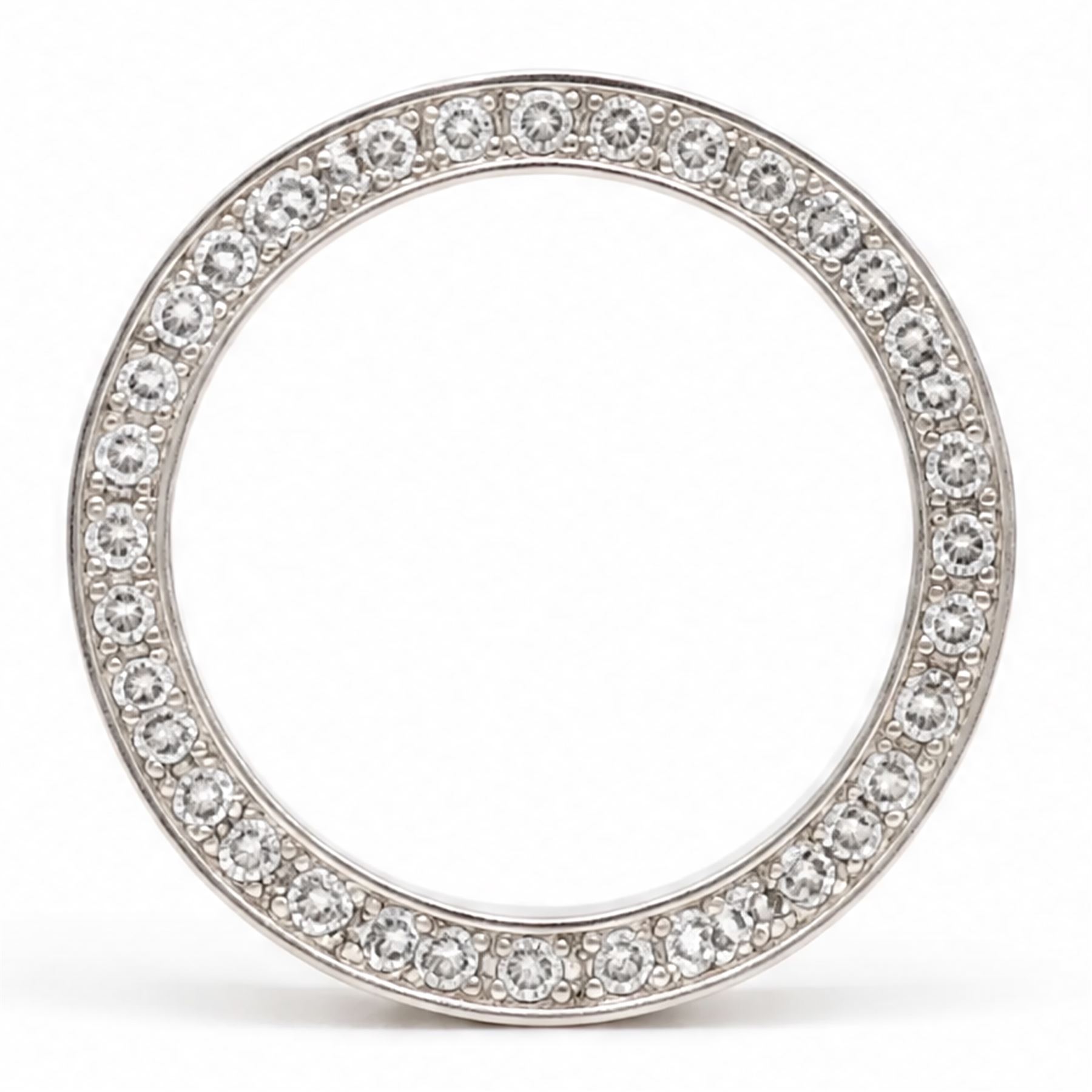 Platinum diamond wedding band, each side set with twenty-eight round brilliant cut diamonds, Sheffield 2000, total diamond weight approx 0.55 carat