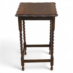Early 20th century mahogany side table; with bedside cabinet, shaped rectangular top on barley twist supports united by stretchers (H 72cm, W 42cm, D 45cm), together with a Late Victorian tiger bamboo occasional table, rectangular two-tier form with woven cane surfaces, the upper tier with raised edge above splayed supports with naturalistic jointing (H 70cm, W 52cm, D 36cm)