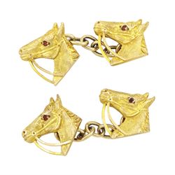 Pair of 9ct gold horse's head cufflinks, set with garnet eyes by Alabaster & Wilson, Birmingham 1961