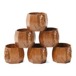 Mouseman - set of six oak napkin rings, with carved mouse signature, by the workshop of Ro...