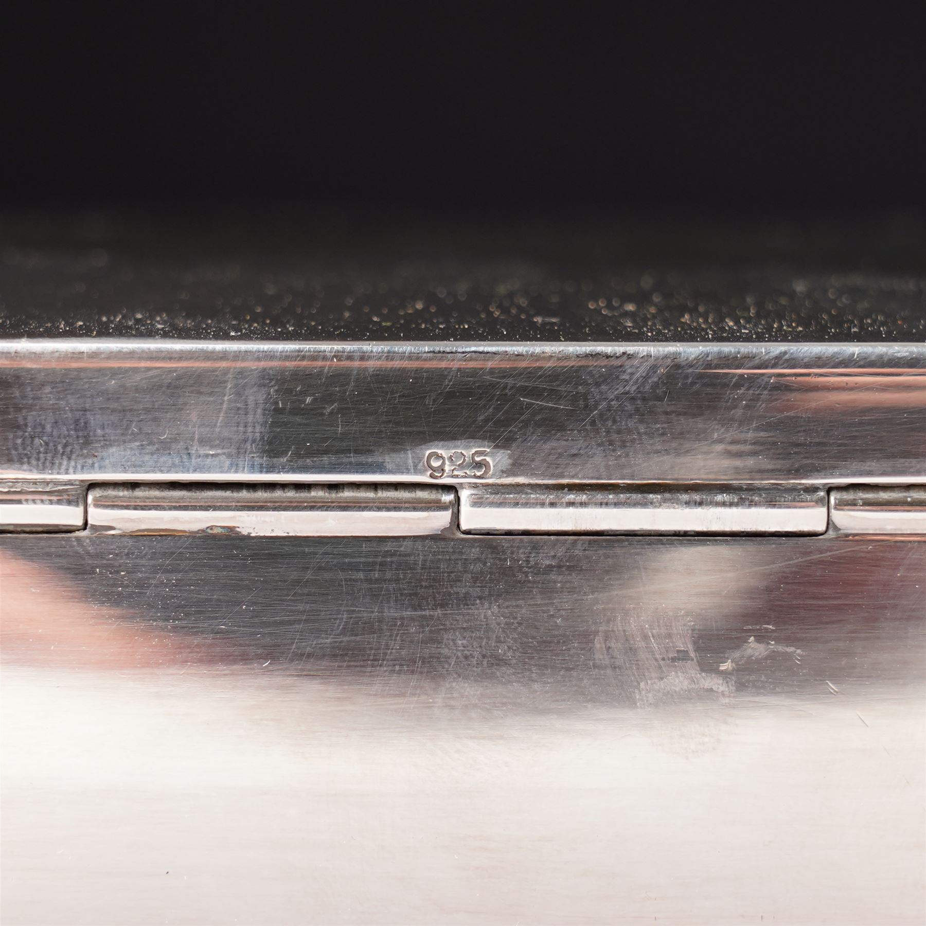 German 925 standard silver cigarette box with hinged lid  and a silver bottle coaster with turned wood base London 1986 Maker M C Hersey & Son