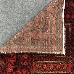 Baluchi red ground rug, repeating border, 154cm x 112cm