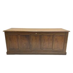 Illingworth Ingham and Co. School Furnishers (Leeds c1900) - early 20th century oak rostrum or headmaster's desk, rectangular top, the front and sides panelled with open reverse, on plinth base