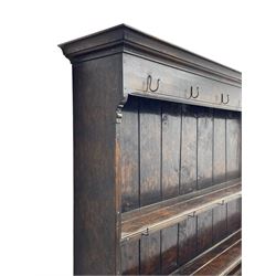 Bylaws of Leominster - 18th century design figured oak dog kennel dresser, the raised plate rack with projecting cornice over hooks and three tiers, moulded rectangular top over three drawers and two panelled cupboards, moulded frame and panelled sides, on stile supports