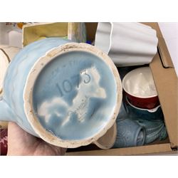 Two Beswick jugs decorated with palm trees, together with matching wall pockets, and similar ceramics, together with six Shelley dishes  