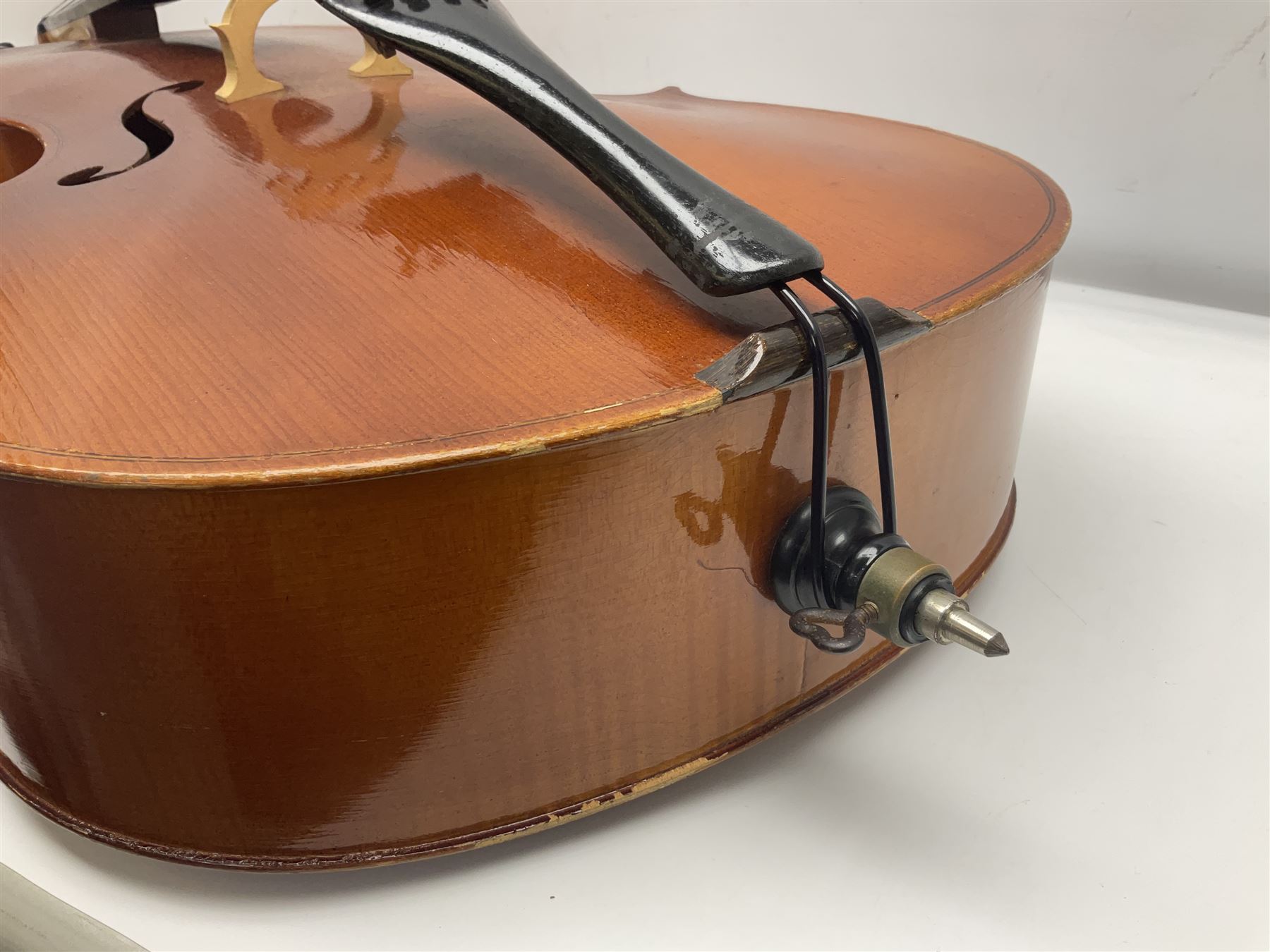 German half-size cello with 69cm two-piece maple back and ribs and spruce top; L112.5cm overall; in soft carrying case with two bows
