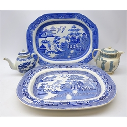  Victorian Spode Pearl ware meat plate printed in the Willow pattern, another Victorian Willow pattern meat plate, a late 18th century English blue and white Willow pattern teapot, H18cm and a 19th century stoneware teapot, applied oak leaf border and figures, Bacchus moulded spout, Victorian Spode blue and white meat plate and another   