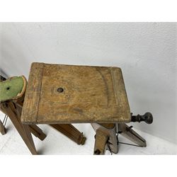 Three wooden adjustable tripods for plate cameras, together with a Linhof of Munchen metal tripod in a canvas case 