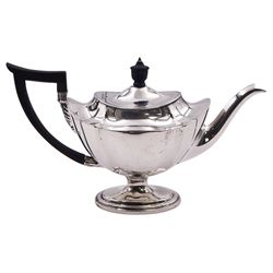 Victorian silver teapot, of oval faceted form with wooden handle and finial, upon oval pedestal foot, hallmarked Thomas Bradbury & Sons, London 1895, approximate gross weight 13.94 ozt (433.6 grams)