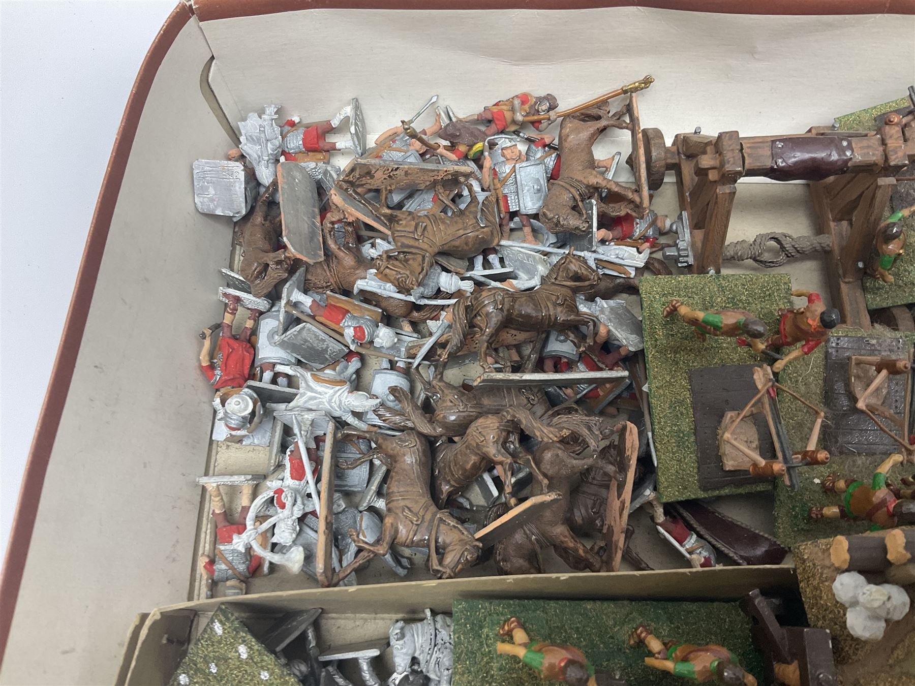 Painted metal wargame figures - over four hundred including Normans and Saxons, Romans, British Tribes etc; together with a quantity of part-painted and unpainted figures, battlefield weapons and accessories etc; average size 25mm