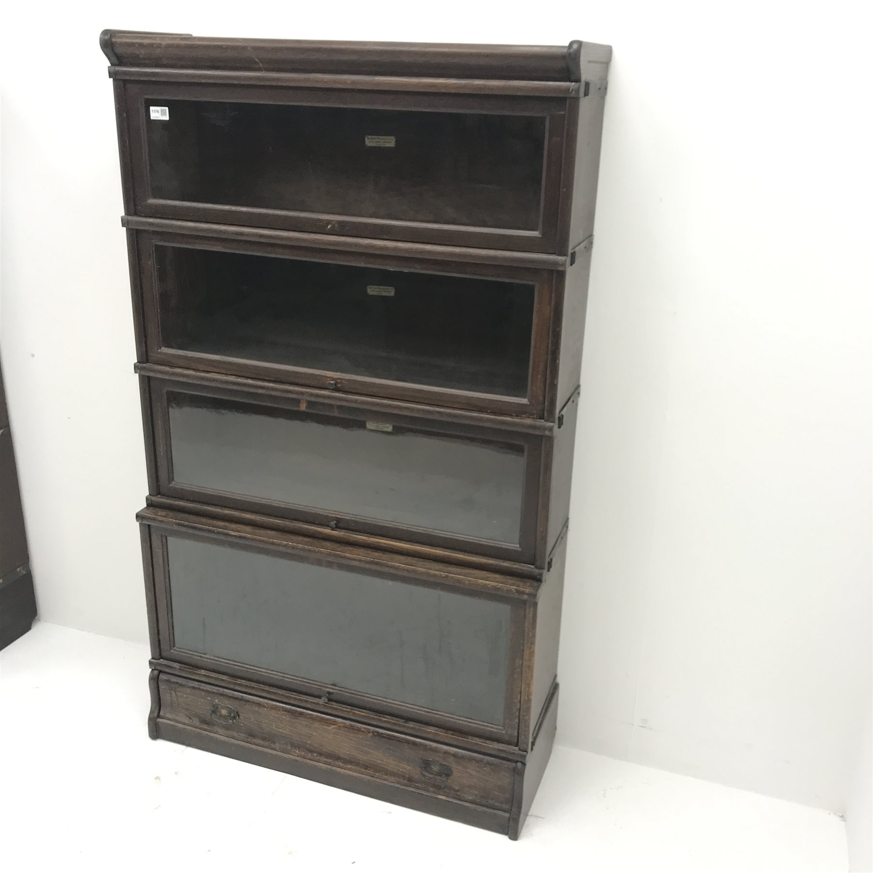 Early 20th century Globe Wernicke oak four tier sectional library bookcase, single drawer, W87cm, H150cm, D332cm