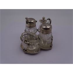 Late Victorian silver mounted four piece cut glass cruet set on stand, comprising pepper shaker, open salt, mustard pot and vinegar bottle, the silver stand with shield engraved with the Workman family crest, hallmarked Hukin & Heath, London 1899, including bottles H7cm