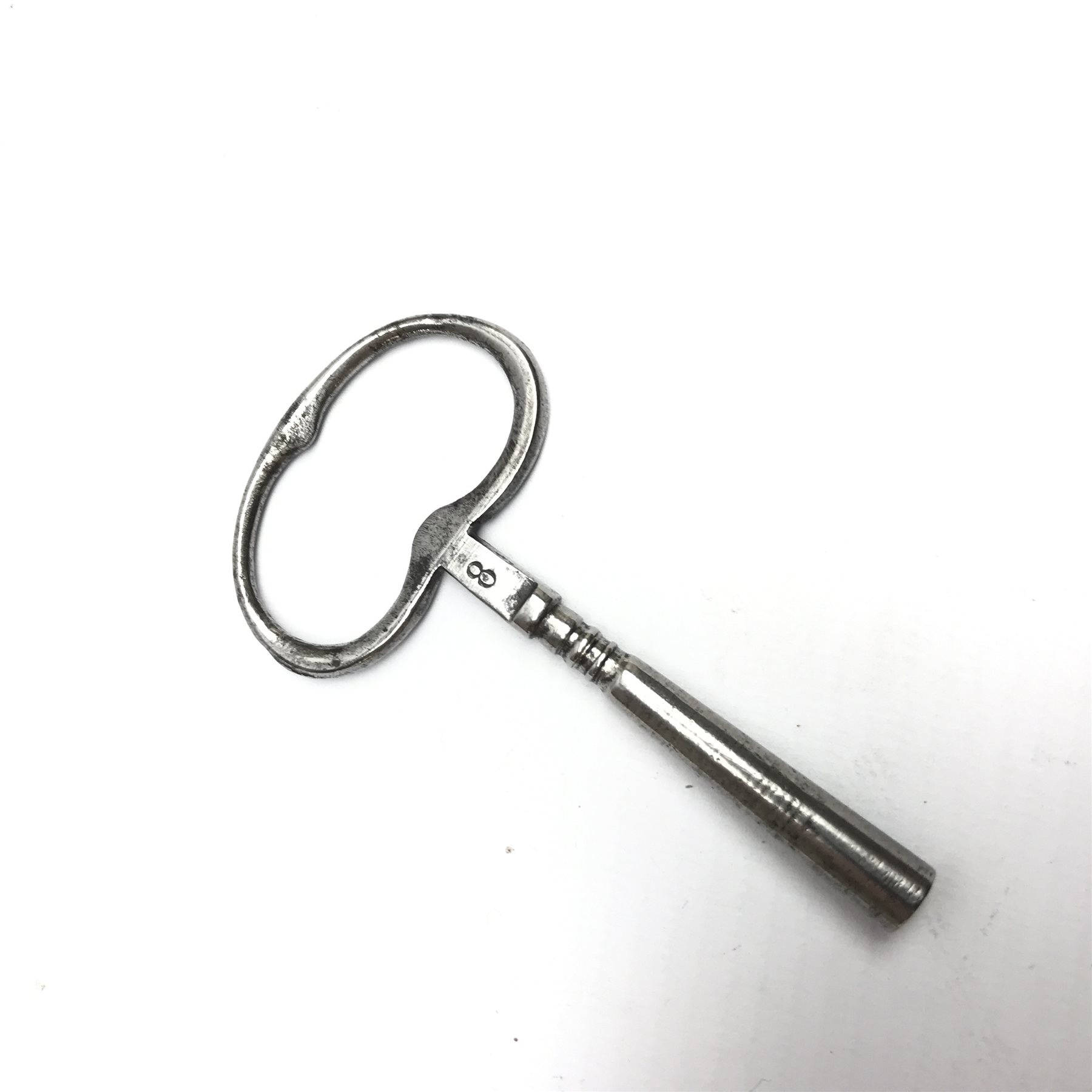 20th century French clock by Planchon Paris, decorative gilt case with shell pediment set on scrolled leafage, circular porcelain segmented dial with Roman and Arabic numerals, bevel glazed front and sides with mirrored interior, acanthus carved feet with scrolled terminals, shell to apron to match, eight day movement striking the hours and half on bell, sunburst and mask cast pendulum, with key, W36cm, H59cm, D21cm